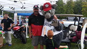 John with the Iron Pigs mascot